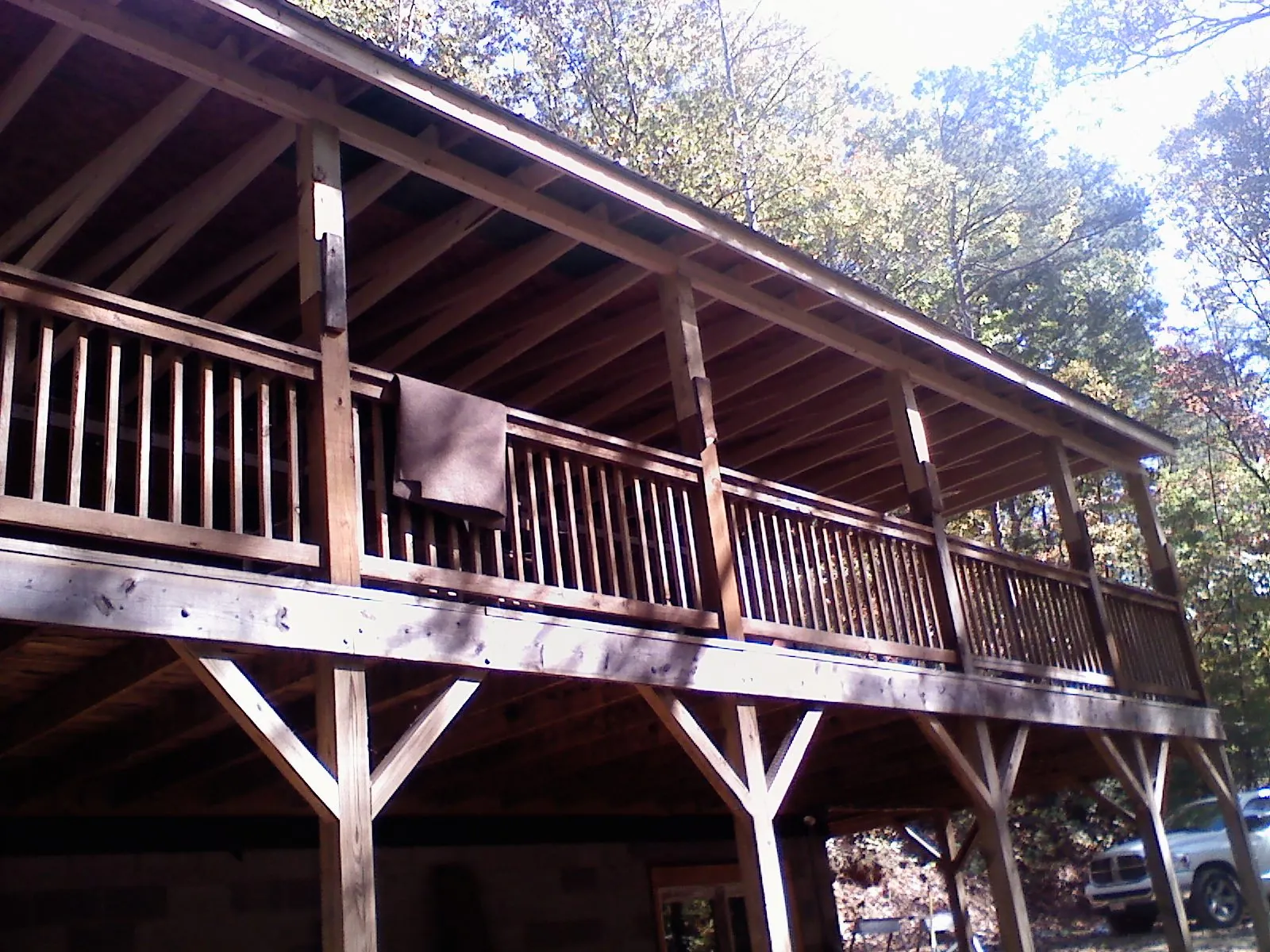 Timber framing under a new elevated porch and deck — Roof Leak Repair in Mottville by Roofing Brothers